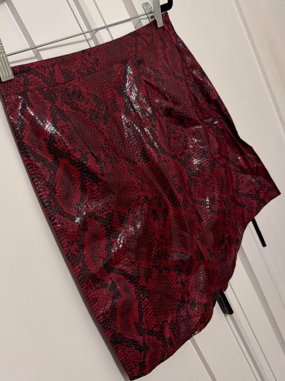 Red snake print mini skirt with zipper closure